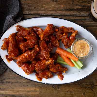 Tender Belly Bacon Jam in a Buffalo Wing Sauce